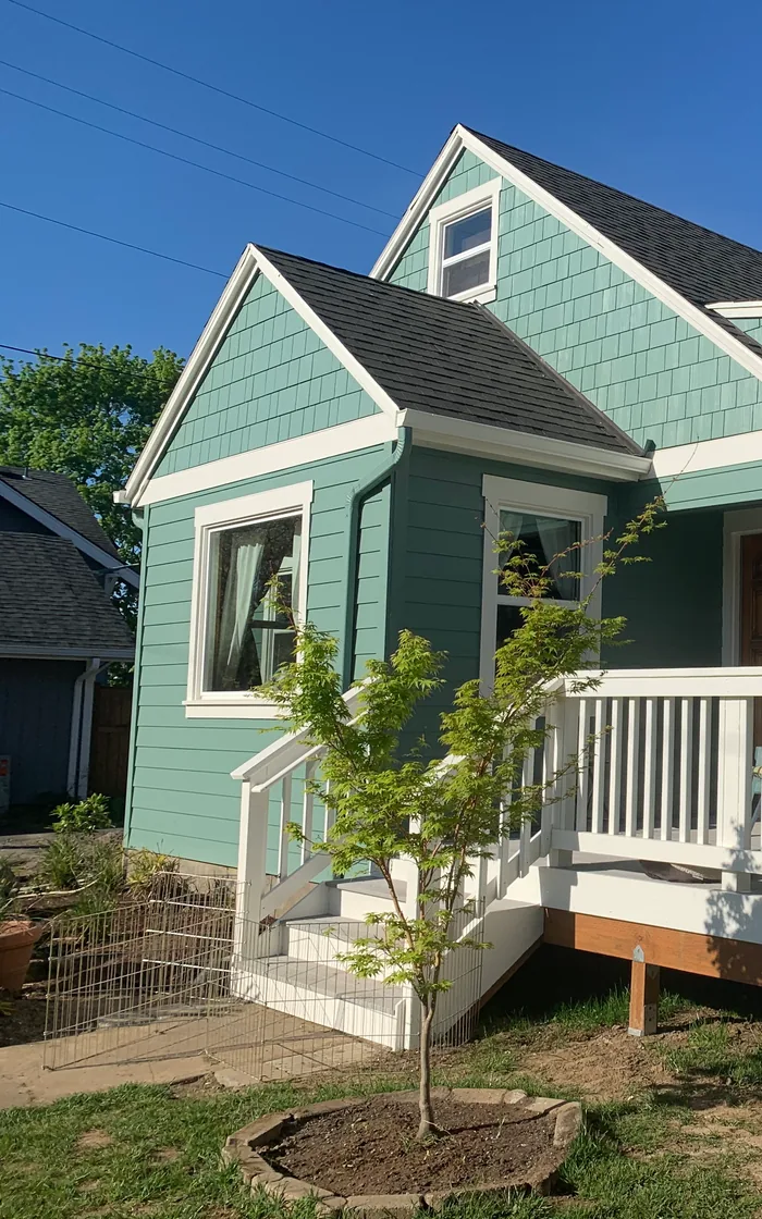 Replacement windows with new trim on a remodeled bungalow
