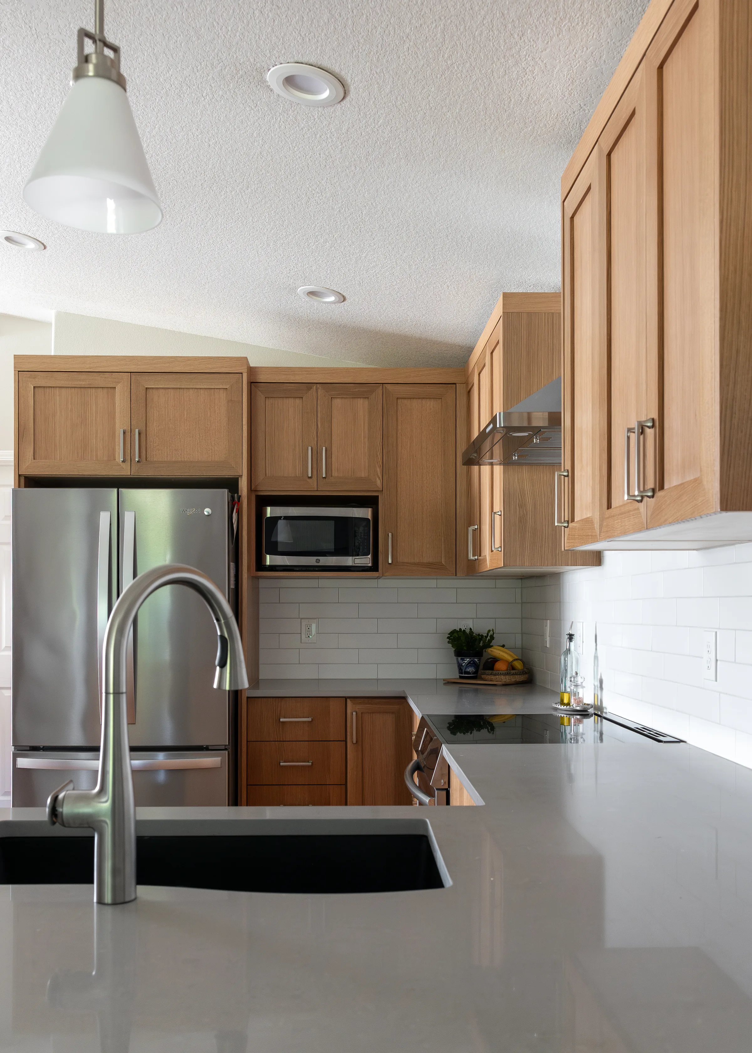 Custom cabinetry and backsplash — whole home remodel