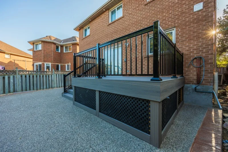 New deck addition with composite decking and black aluminum railing