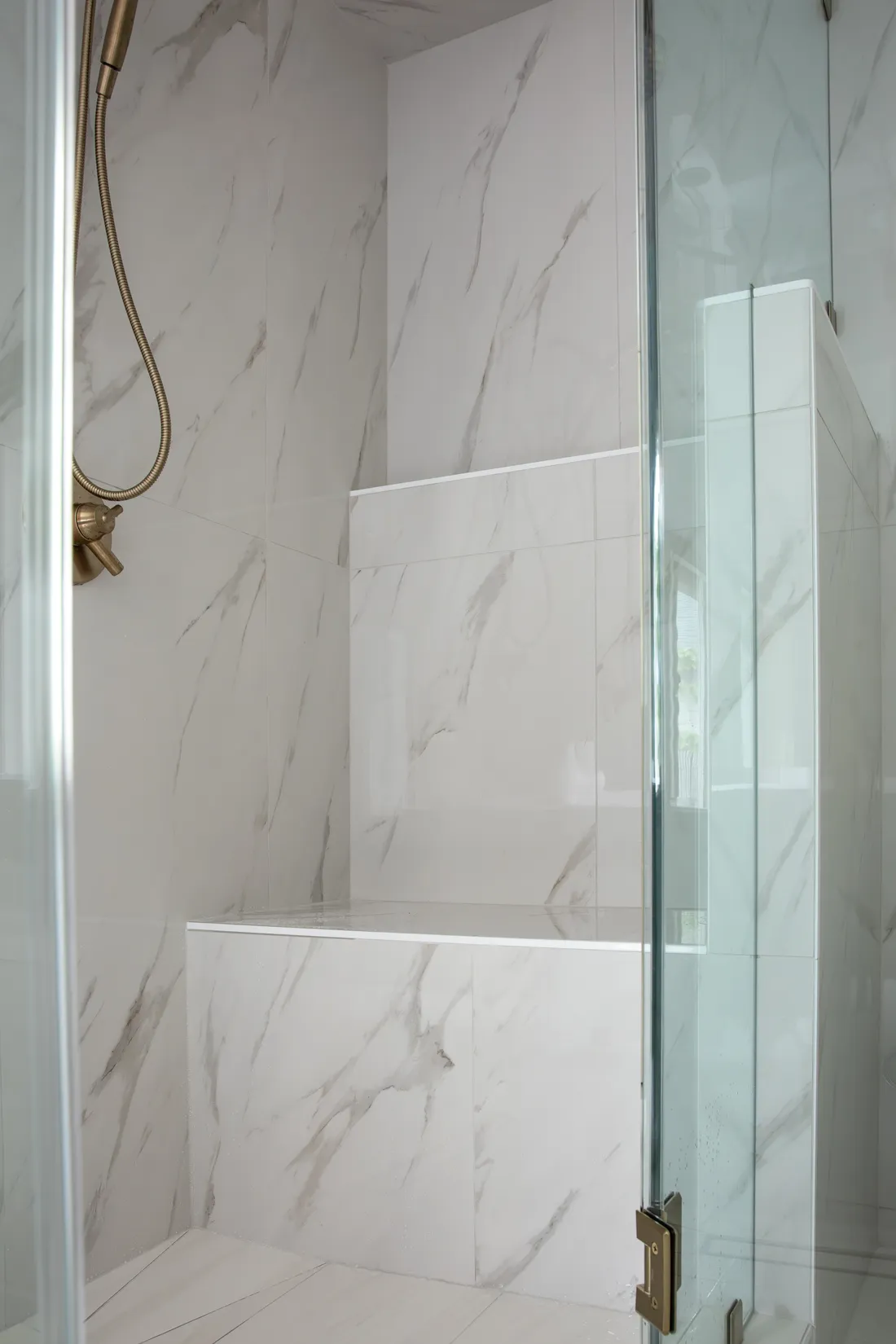 Custom bathroom remodel with porcelain tile and recessed lighting Portland OR