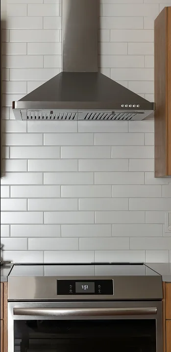 Range hood and subway tile backsplash