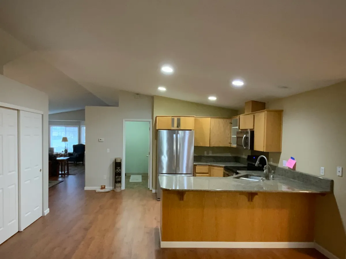Kitchen and living area before the remodel