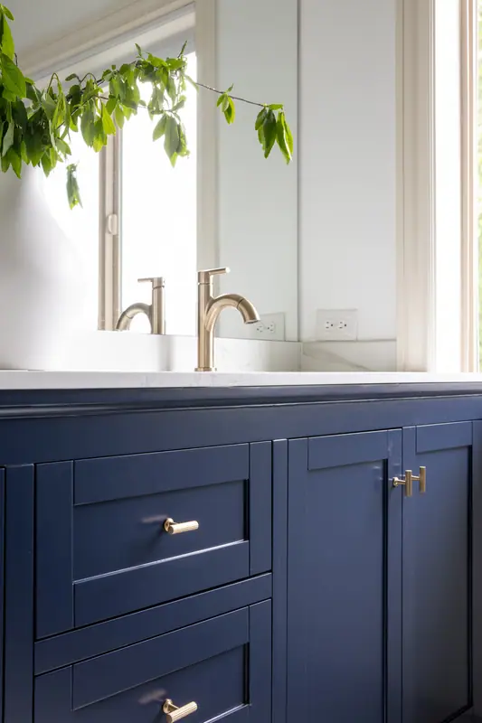 Undermount sink and quartz counter detail on the double vanity