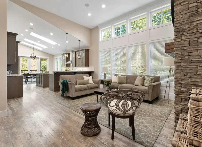 Great room looking through to the kitchen, with clerestory windows above the window wall — Vancouver, WA
